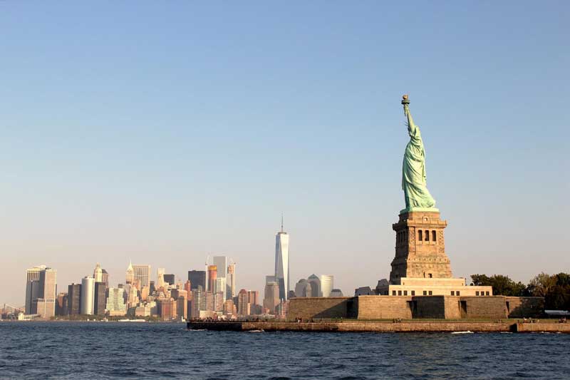 nyc skyline and statue of liberty